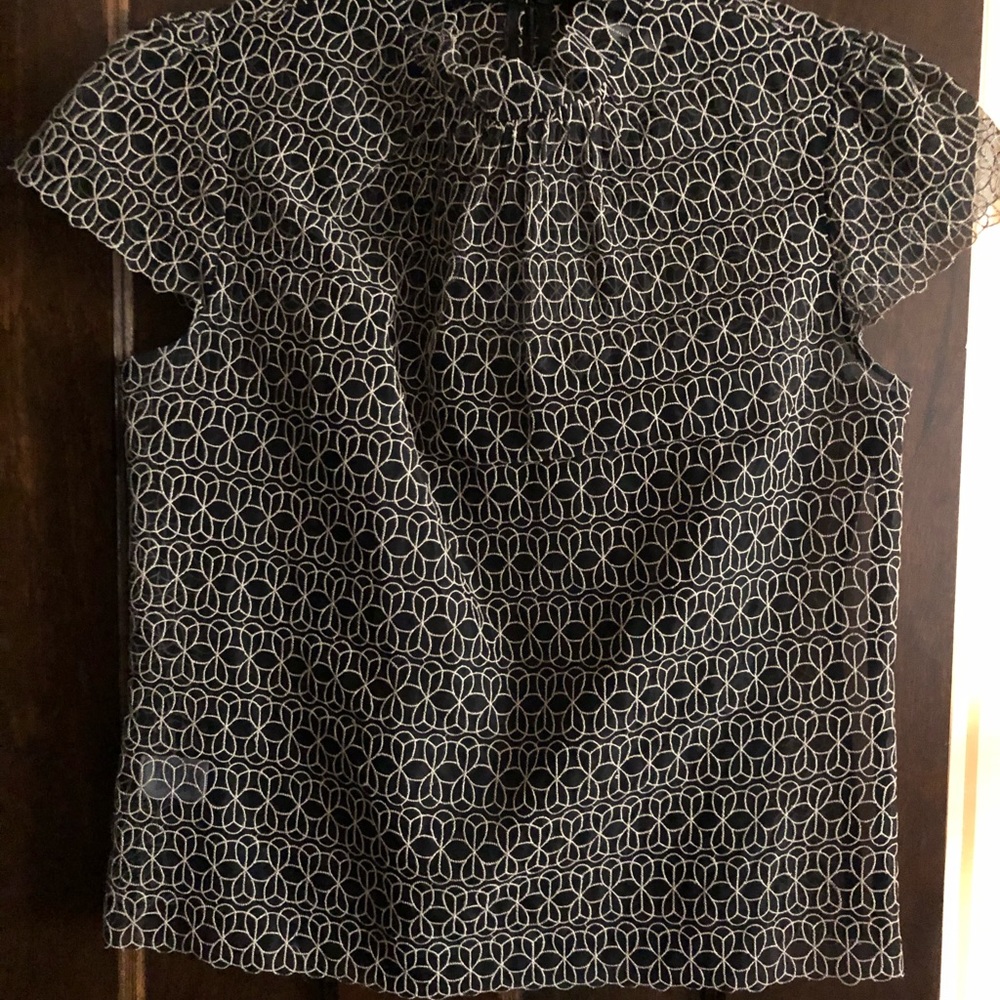 Excellent condition- Lace top with black camisole.